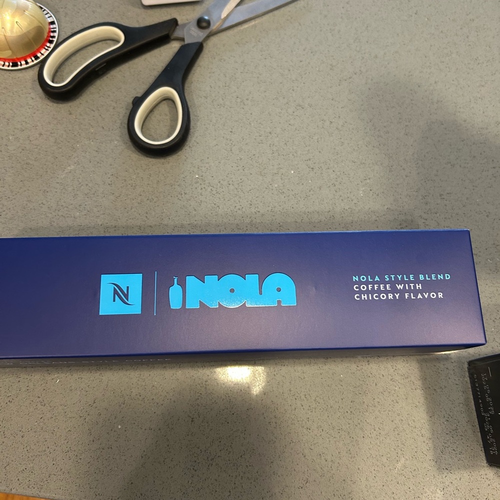 two Nespresso NOLA capsules boxes